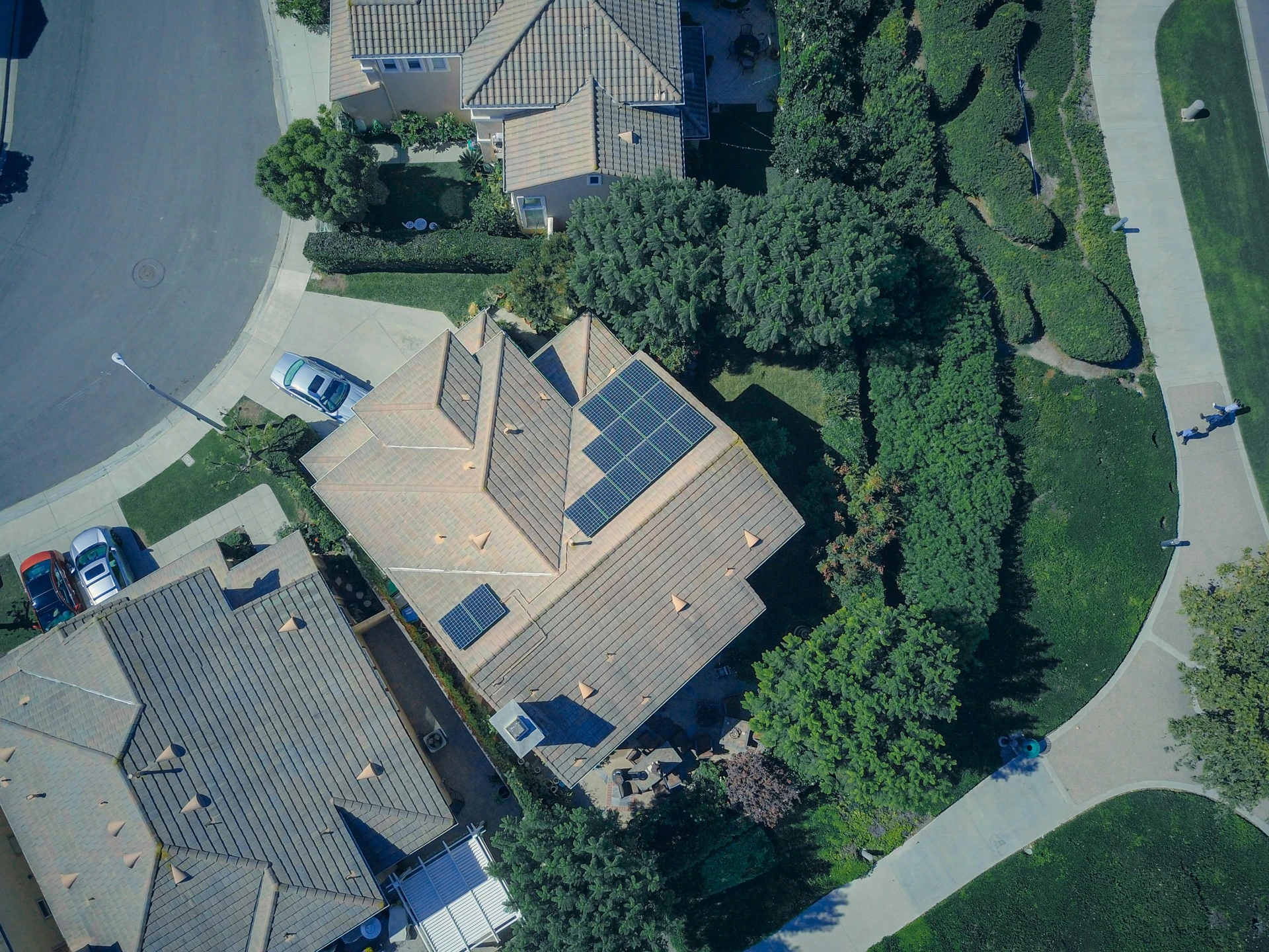 Aerial view of homes with solar panels